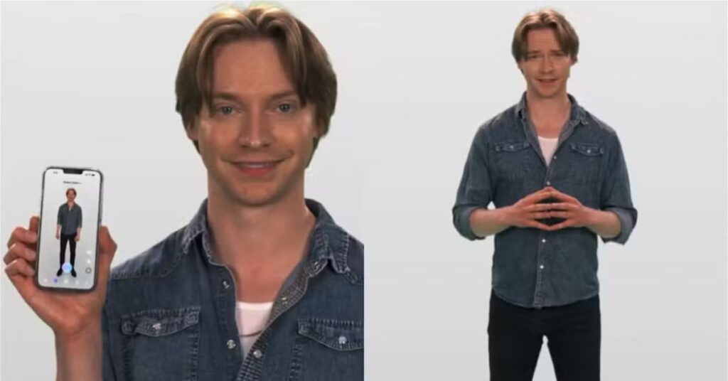 Homem apresenta avatar digital em celular, ilustrando tecnologia de IA que cria 'reencontros' virtuais.