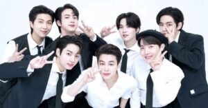 retorno do BTS com os sete integrantes reunidos em imagem oficial