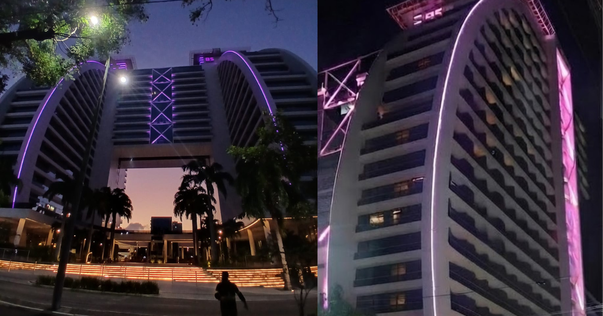 Fachada do BS Design iluminada na cor vinho durante campanha de conscientização sobre Alzheimer em Fortaleza.