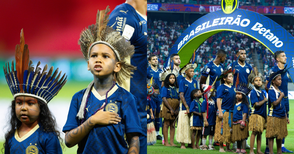 Crianças indígenas com jogadores do Bahia durante entrada em campo na Arena Fonte Nova.